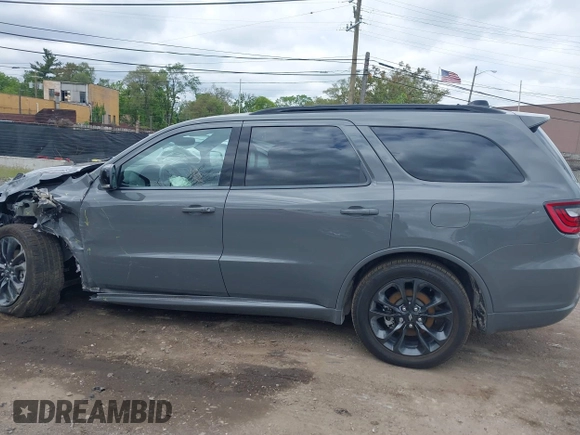 2023 Dodge Durango R/T with VIN 1C4SDJCT5PC551011, listed as a IAAI auction lot 42336477 with 39,754 mi miles and . Bid and sale history available at DreamBid. Image 14.