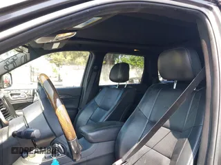 2014 Jeep Grand Cherokee Summit with VIN 1C4RJFJG8EC434899, listed as a IAAI auction lot 42399912 with 186,840 mi miles and . Bid and sale history available at DreamBid. Image 22.