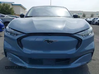 2024 Ford Mustang Mach-E Premium z VIN 3FMTK3R74RMA22243, wystawiony jako IAAI lot #42157639 z przebiegiem 14 032 mil mil oraz . Historia ofert i sprzedaży dostępna na DreamBid. Obrazek 12.