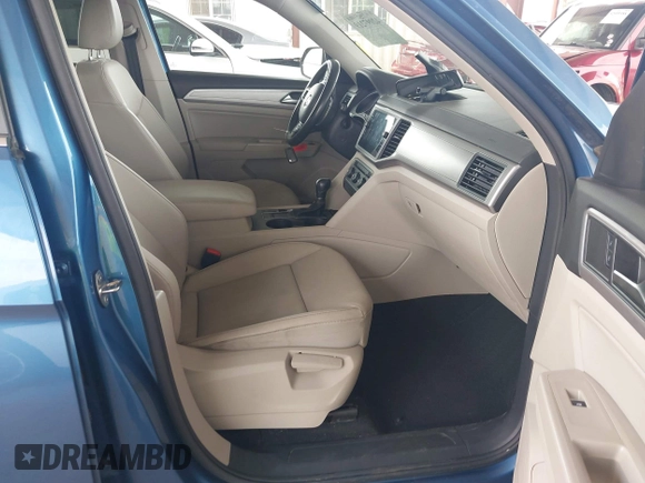 2019 Volkswagen Atlas SE with VIN 1V2DR2CA7KC516363, listed as a IAAI auction lot 42097219 with 92,152 mi miles and . Bid and sale history available at DreamBid. Image 5.