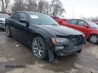 2014 Chrysler 300 S with VIN 2C3CCABG9EH373159, listed as a IAAI auction lot 41707636 with 218,045 mi miles and . Bid and sale history available at DreamBid. Image 1.
