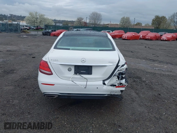 2017 Mercedes-Benz E E 300 Luxury with VIN WDDZF4KBXHA108620, listed as a IAAI auction lot 41935260 with 81,684 mi miles. Bid and sale history available at carsss.com. Image 16.
