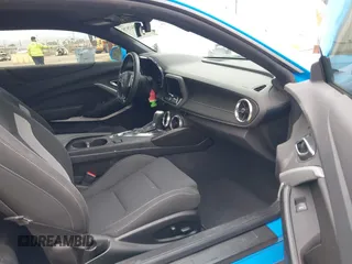 2023 Chevrolet Camaro 1LT с VIN 1G1FB1RX0P0135721, выставлен на аукционе IAAI как лот 42047575 с пробегом 16 443 миль миль и . История ставок и продаж доступна на DreamBid. Изображение 5.
