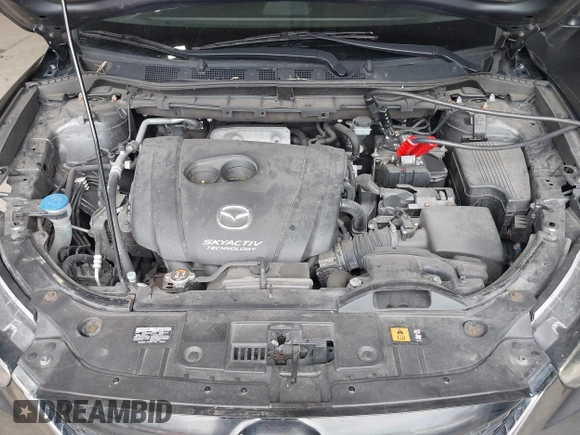 2015 Mazda CX-5 Touring with VIN JM3KE4CY6F0510002, listed as a IAAI auction lot 42045284 with 88,949 mi miles and . Bid and sale history available at DreamBid. Image 10.