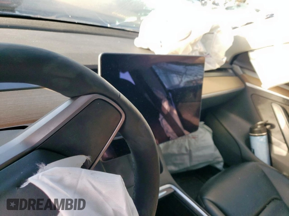 2021 Tesla Model 3 Standard Range Plus with VIN 5YJ3E1EA2MF977007, listed as a Copart auction lot 48516075 with Not Provided miles and Salvage Title. Bid and sale history available at DreamBid. Image 9.