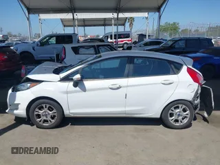 2014 Ford Fiesta SE z VIN 3FADP4EJ4EM117919, wystawiony jako IAAI lot #42262361 z przebiegiem 121 141 mil mil oraz . Historia ofert i sprzedaży dostępna na DreamBid. Obrazek 14.