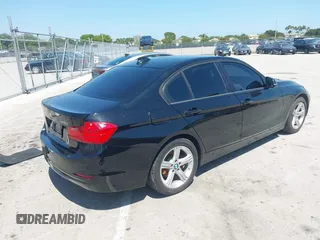 2014 BMW 3 Series 320i with VIN WBA3B1G54ENS79121, listed as a IAAI auction lot 41940001 with 41,835 mi miles. Bid and sale history available at carsss.com. Image 4.