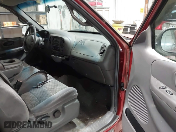 2002 Ford F-150 XL with VIN 1FTRX17L12NA36715, listed as a IAAI auction lot 41850555 with 174,012 mi miles. Bid and sale history available at carsss.com. Image 5.