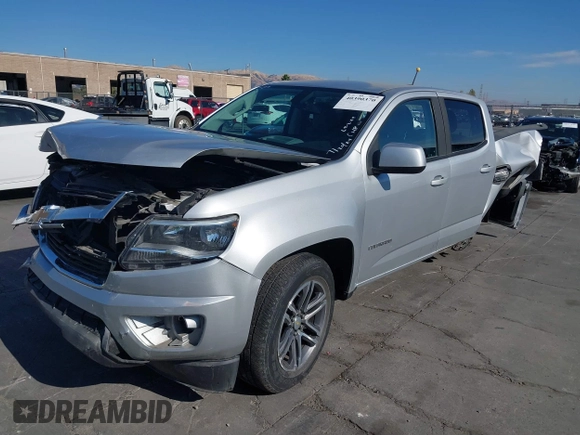 2020 Chevrolet Colorado 2WD Work Truck with VIN 1GCGSBEN0L1209889, listed as a IAAI auction lot 40390370 with 67,417 mi miles and . Bid and sale history available at DreamBid. Image 18.