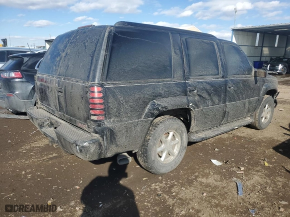 1999 GMC Denali with VIN 1GKEK13R1XR914199, listed as a Copart auction lot 46247985 with 143,628 mi miles and Salvage Title. Bid and sale history available at carsss.com. Image 3.