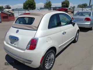 2012 FIAT 500 Lounge with VIN 3C3CFFER2CT384610, listed as a IAAI auction lot 42369091 with 116,870 mi miles and . Bid and sale history available at DreamBid. Image 4.