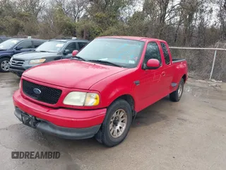 2003 Ford F-150 XL with VIN 1FTRX07W73KD62770, listed as a IAAI auction lot 41451484 with Not provided miles and . Bid and sale history available at DreamBid. Image 2.