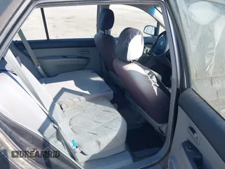 2007 Kia Rondo LX with VIN KNAFG525877075202, listed as a IAAI auction lot 42014611 with 206,496 mi miles. Bid and sale history available at carsss.com. Image 8.