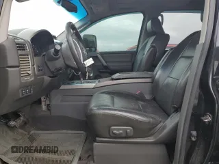 2005 Nissan Titan LE with VIN 1N6AA07B15N552302, listed as a Copart auction lot 44396985 with 172,401 mi miles and Salvage Title. Bid and sale history available at carsss.com. Image 7.