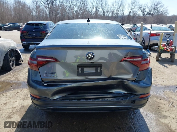 2022 Volkswagen Jetta Sport with VIN 3VWBM7BU6NM017084, listed as a IAAI auction lot 41784555 with 60,364 mi miles and . Bid and sale history available at DreamBid. Image 16.