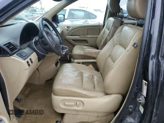 2009 Honda Odyssey EX-L z VIN 5FNRL38799B058592, wystawiony jako Copart lot #58528595 z przebiegiem 150 764 mil mil oraz Czysty tytuł • Clean title. Historia ofert i sprzedaży dostępna na DreamBid. Obrazek 7.