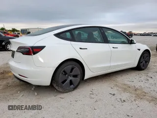 2023 Tesla Model 3 z VIN 5YJ3E1EA3PF488040, wystawiony jako Copart lot #52628165 z przebiegiem 22 326 mil mil oraz Czysty tytuł • Clean title. Historia ofert i sprzedaży dostępna na DreamBid. Obrazek 3.