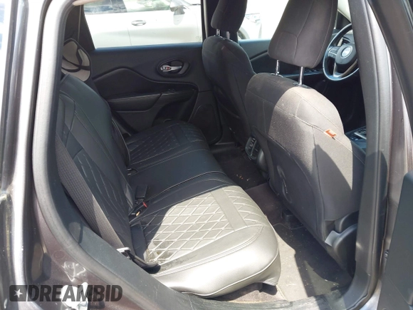 2016 Jeep Cherokee Latitude z VIN 1C4PJMCB9GW293047, wystawiony jako IAAI lot #42325392 z przebiegiem 127 706 mil mil oraz . Historia ofert i sprzedaży dostępna na DreamBid. Obrazek 8.