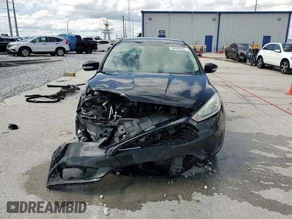 2015 Ford Focus SE with VIN 1FADP3F23FL242768, listed as a Copart auction lot 58068865 with 172,163 mi miles and Salvage title. Bid and sale history available at DreamBid. Image 14.