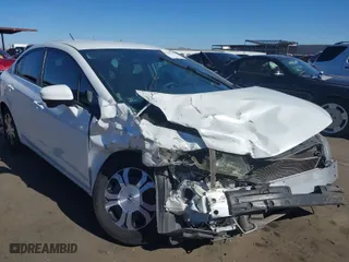 2014 Honda Civic Hybrid with VIN 19XFB4F27EE001410, listed as a IAAI auction lot 41397447 with 124,685 mi miles. Bid and sale history available at carsss.com. Image 6.