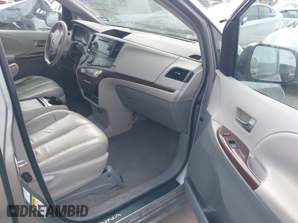 2011 Toyota Sienna XLE with VIN 5TDDK3DC0BS016250, listed as a IAAI auction lot 42156903 with 201,821 mi miles and . Bid and sale history available at DreamBid. Image 5.