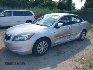 2010 Honda Accord LX with VIN 1HGCP2F32AA037716, listed as a IAAI auction lot 39982111 with 130,295 mi miles and . Bid and sale history available at DreamBid. Image 2.
