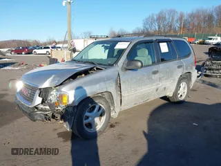 2005 GMC Envoy SLE with VIN 1GKDT13S452194933, listed as a IAAI auction lot 41426512 with 176,897 mi miles. Bid and sale history available at carsss.com. Image 17.