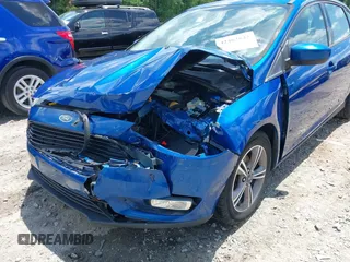 2018 Ford Focus SE with VIN 1FADP3FE8JL238024, listed as a IAAI auction lot 42463643 with Not provided miles and . Bid and sale history available at DreamBid. Image 6.