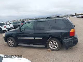 2003 GMC Envoy SLT z VIN 1GKDS13S232298062, wystawiony jako IAAI lot #41668380 z przebiegiem 195 045 mil mil oraz . Historia ofert i sprzedaży dostępna na DreamBid. Obrazek 14.