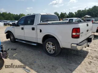 2006 Ford F-150 XLT with VIN 1FTPW12566KA90649, listed as a Copart auction lot 63287565 with 245,951 mi miles and Salvage title. Bid and sale history available at DreamBid. Image 2.