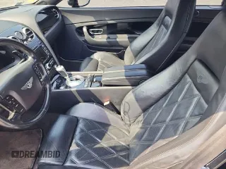 2008 Bentley Continental GT with VIN SCBDR33W68C052142, listed as a Copart auction lot 69032654 with 79,229 mi miles and Salvage Title. Bid and sale history available at DreamBid. Image 10.