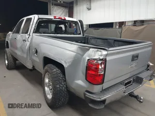 2018 Chevrolet Silverado 1500 LT with VIN 1GCVKREC1JZ151188, listed as a IAAI auction lot 42153618 with 82,391 mi miles and . Bid and sale history available at DreamBid. Image 3.