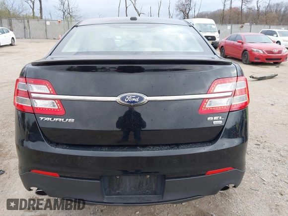 2016 Ford Taurus SEL z VIN 1FAHP2H80GG130887, wystawiony jako IAAI lot #41911575 z przebiegiem 138 469 mil mil oraz . Historia ofert i sprzedaży dostępna na DreamBid. Obrazek 16.