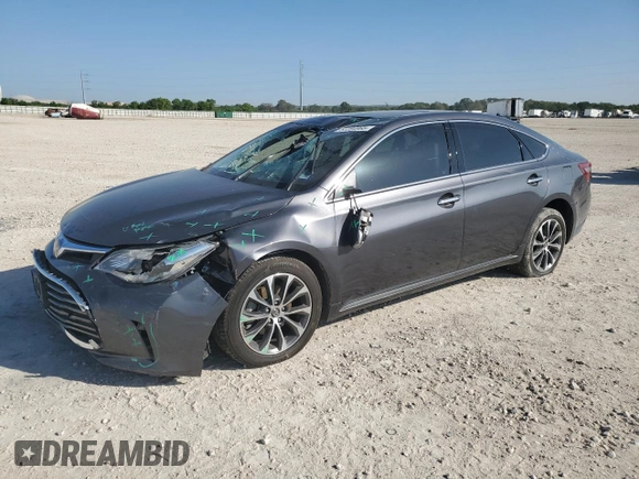 2018 Toyota Avalon XLE with VIN 4T1BK1EB9JU276380, listed as a Copart auction lot 52204965 with 110,860 mi miles and Salvage Title. Bid and sale history available at DreamBid. Image 1.