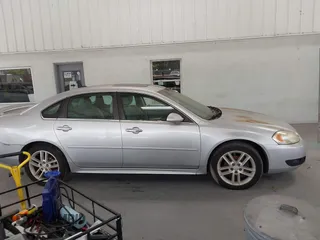 2015 Chevrolet Impala LTZ with VIN 2G1WC5E39F1115364, listed as a IAAI auction lot 42152951 with 122,335 mi miles and . Bid and sale history available at DreamBid. Image 13.