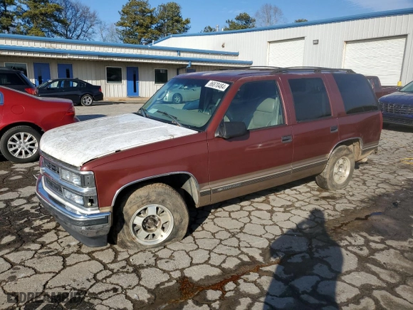 1999 Chevrolet Tahoe with VIN 1GNEC13RXXJ385740, listed as a Copart auction lot 86870484 with 271,302 mi miles and Salvage Title. Bid and sale history available at carsss.com. Image 1.