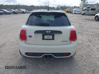 2017 MINI Hardtop 4 Door Cooper S z VIN WMWXU3C54H2D32602, wystawiony jako IAAI lot #41458333 z przebiegiem 124 235 mil mil oraz . Historia ofert i sprzedaży dostępna na DreamBid. Obrazek 16.
