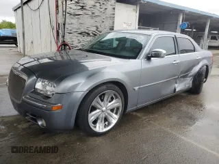2006 Chrysler 300 C with VIN 2C3KA63H26H218136, listed as a Copart auction lot 49209315 with 215,682 mi miles and Salvage Title. Bid and sale history available at carsss.com. Image 1.