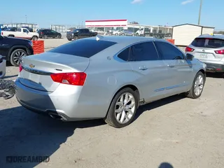 2019 Chevrolet Impala Premier with VIN 1G1105S37KU123162, listed as a IAAI auction lot 41028244 with 107,872 mi miles. Bid and sale history available at carsss.com. Image 4.