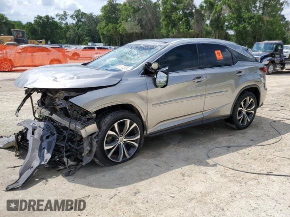 2017 Lexus RX 350 z VIN 2T2ZZMCAXHC075715, wystawiony jako Copart lot #60793845 z przebiegiem 73 633 mil mil oraz Szkoda całkowita • Salvage title. Historia ofert i sprzedaży dostępna na DreamBid. Obrazek 1.