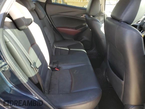 2017 Mazda CX-3 Touring z VIN JM1DKDC74H0165654, wystawiony jako Copart lot #41928295 z przebiegiem 173 567 mil mil oraz Szkoda całkowita • Salvage title. Historia ofert i sprzedaży dostępna na DreamBid. Obrazek 11.