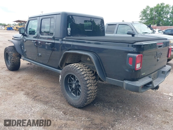 2021 Jeep Gladiator Sport S with VIN 1C6JJTAM7ML554412, listed as a IAAI auction lot 42199167 with 74,263 mi miles and . Bid and sale history available at DreamBid. Image 3.