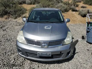 2007 Nissan Versa 1.8 S with VIN 3N1BC11E17L446450, listed as a Copart auction lot 52631415 with 121,006 mi miles and Salvage Title. Bid and sale history available at carsss.com. Image 5.