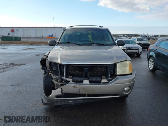2003 GMC Envoy SLT with VIN 1GKDT13S532308502, listed as a IAAI auction lot 41676188 with 218,626 mi miles. Bid and sale history available at carsss.com. Image 12.