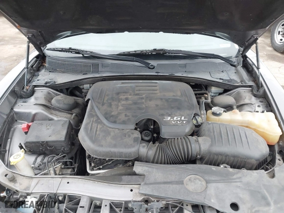 2014 Dodge Charger SE with VIN 2C3CDXBG8EH357664, listed as a IAAI auction lot 41860609 with 94,918 mi miles. Bid and sale history available at carsss.com. Image 10.