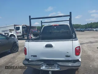 2001 Ford F-150 XLT with VIN 1FTRW07L91KB77612, listed as a IAAI auction lot 42432387 with 106,574 mi miles and . Bid and sale history available at DreamBid. Image 16.