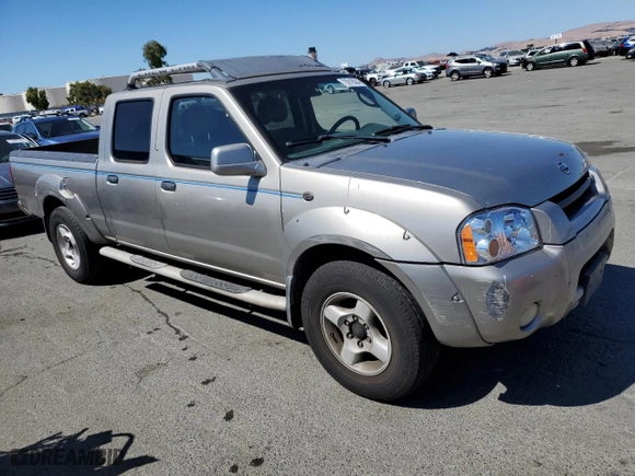 2002 Nissan Frontier 2WD SE with VIN 1N6ED29X12C390093, listed as a Copart auction lot 70916564 with 299000 miles and Salvage Title. Bid and sale history available at carsss.com. Image 4.