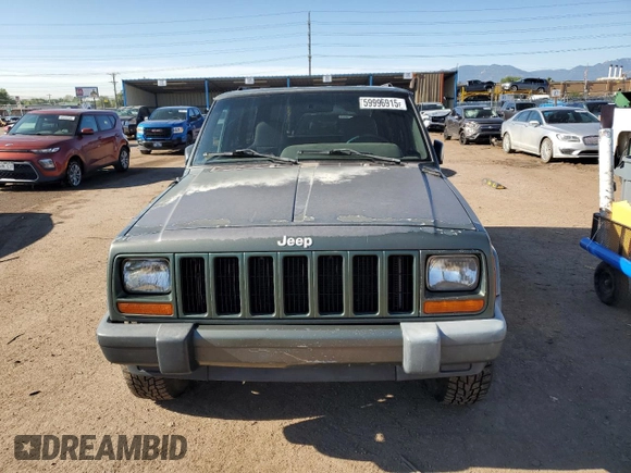 2000 Jeep Cherokee with VIN 1J4FF48S0YL198802, listed as a Copart auction lot 59996915 with 249,756 mi miles and Salvage title. Bid and sale history available at DreamBid. Image 5.