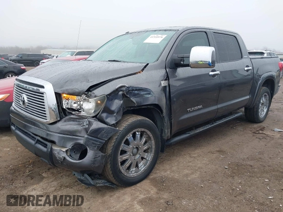 2012 Toyota Tundra 4WD Truck LTD with VIN 5TFHW5F17CX211075, listed as a IAAI auction lot 41510976 with 204,930 mi miles. Bid and sale history available at carsss.com. Image 2.