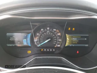 2014 Ford Fusion Titanium with VIN 3FA6P0K94ER277040, listed as a Copart auction lot 88780385 with 131,545 mi miles and Salvage Title. Bid and sale history available at DreamBid. Image 9.